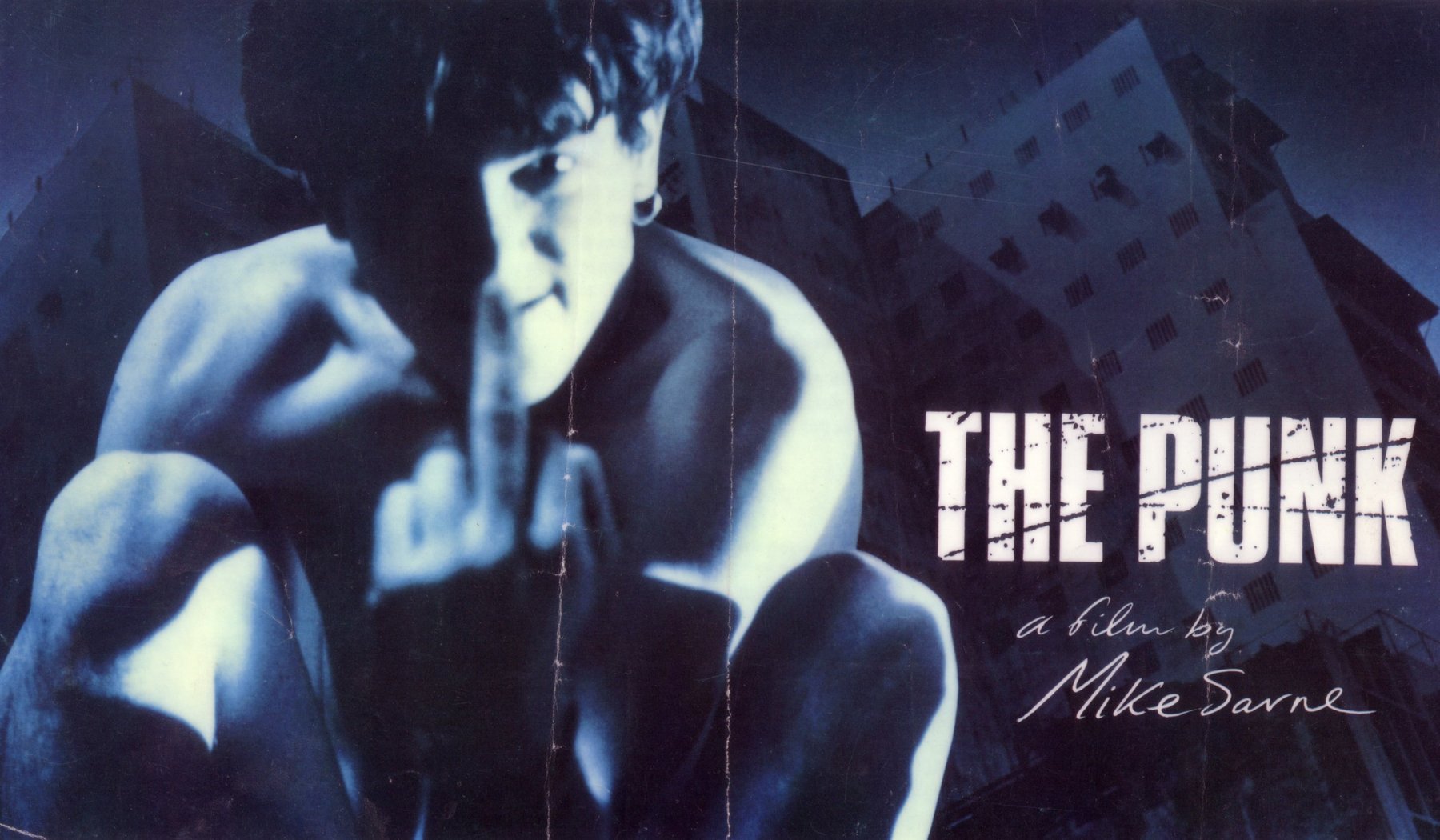 Flyer: Charlie Creed-Miles in front of a tower block. The Punk, a film by Mike Sarne