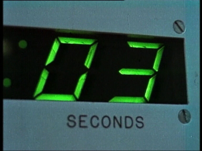 A green digital display reading 03 seconds